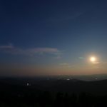Rocky Knob Gorge Overlook moonrise at night with moon, mist, fireworks
